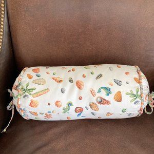 Roll pillow with shell print